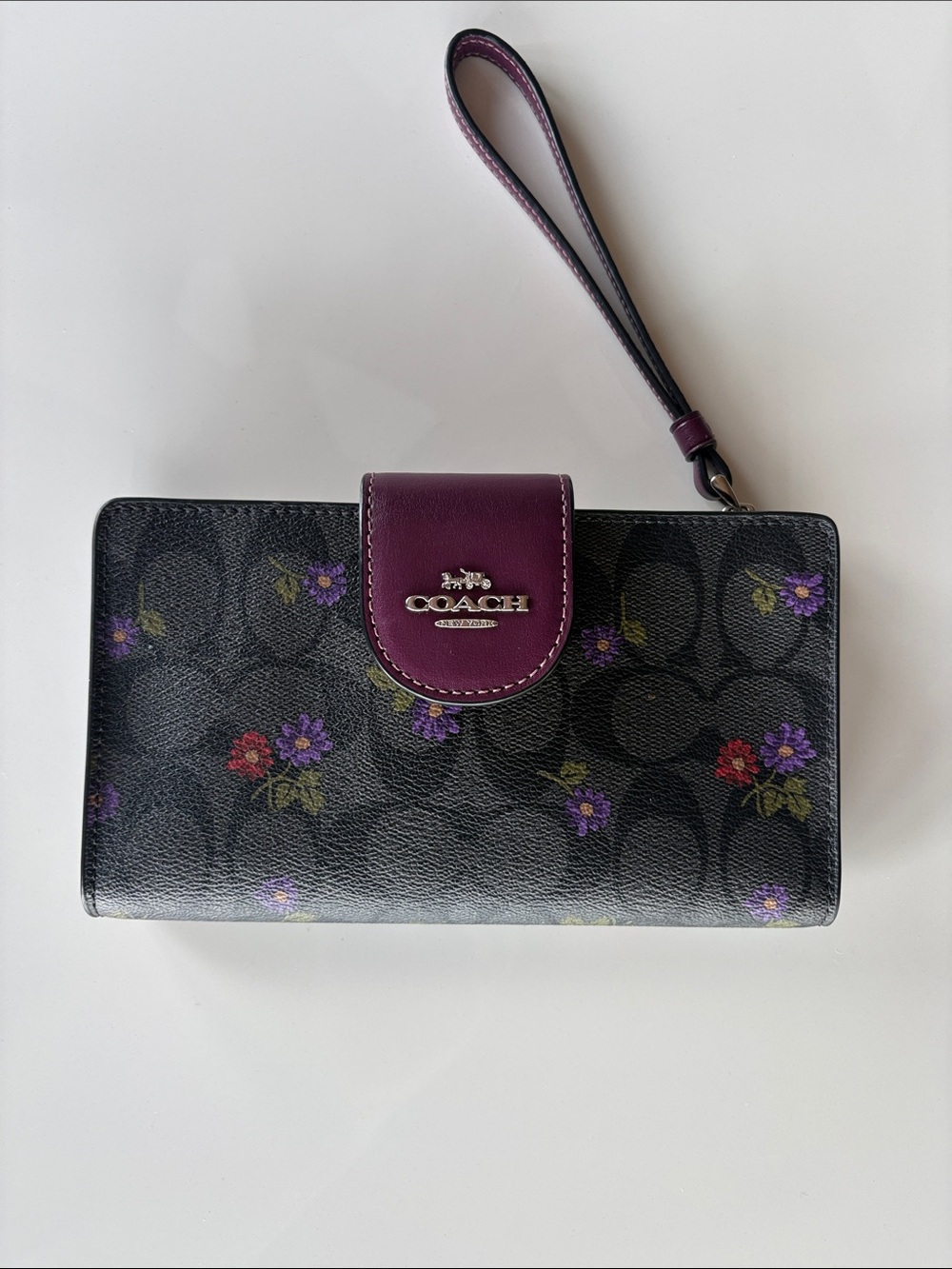 Coach Black Signature Floral Wristlet with Plum Trim